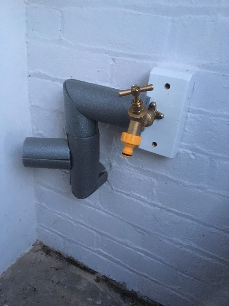 replumbed outdoor tap with insulated pipes